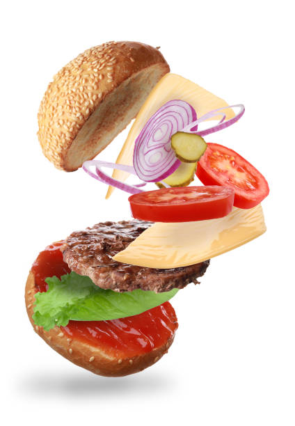istock Delicious burger with different flying ingredients on white background 1646873933