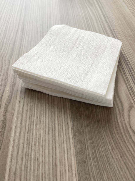 istock White paper napkins on the wood table 1646891072