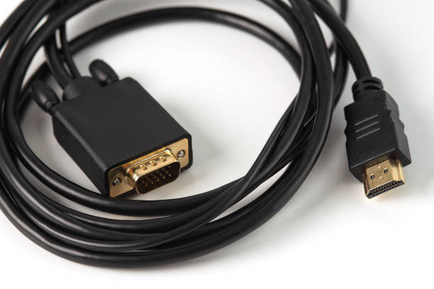 istock HDMI to VGA and audio adapter on white background. Allows users to connect devices with various types of displays such as computers to projectors or other types of displays. 1646893785