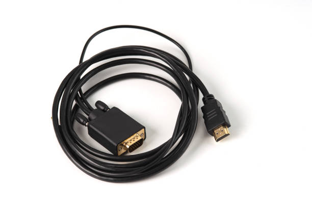 istock HDMI to VGA and audio adapter on white background. Allows users to connect devices with various types of displays such as computers to projectors or other types of displays. 1646897644