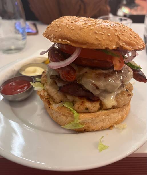 istock Big burger served in a restaurant. 1646902954