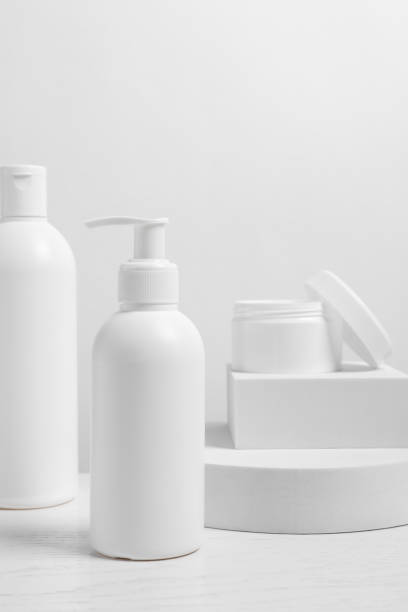 istock Different cosmetic products on white wooden table 1646920772