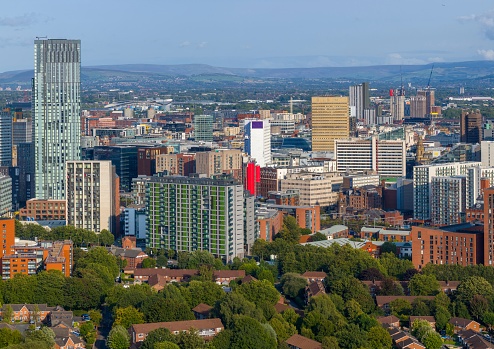 Panoramic aerial view of Manchester cityscape shot from Salford area.