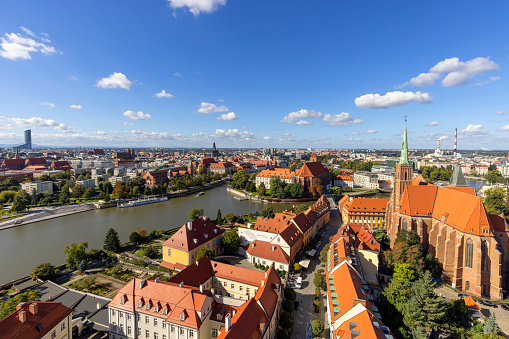 Wroclaw, Poland - September 30, 2021: Aerial view of Collegiate Church of the Holy Cross and St Bartholomew from the tower of Wroclaw Cathedral. It is a Gothic church in Ostrow Tumski
