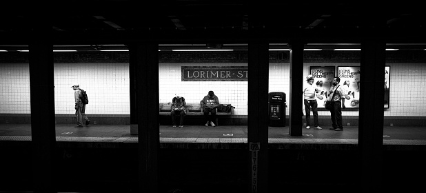 Brooklyn,NY USA- 2021 Passengers waiting for the MTA Subway Train at L train Lorimer Street Station