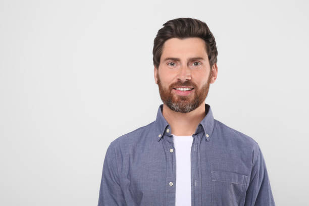 istock Portrait of handsome man on white background, space for text 1646961926