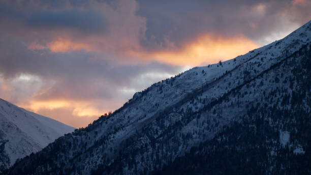 istock Dramatic sunset sky over rocky mountain wilderness 1646980826