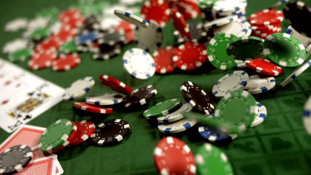 HD Super Slow-Mo: Chips Falling On A Poker Table