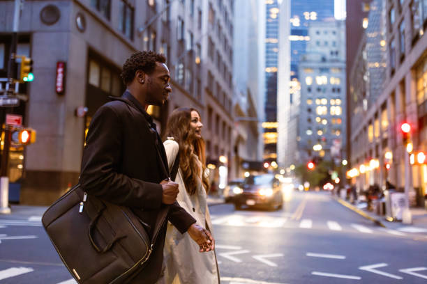 istock Colleagues rushing through Wall Street area 1647090228