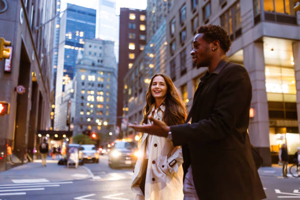 istock Colleagues rushing through Wall Street area 1647090751