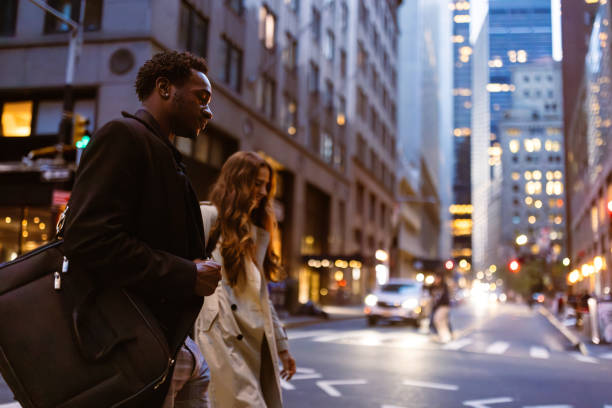 istock Colleagues rushing through Wall Street area 1647090753