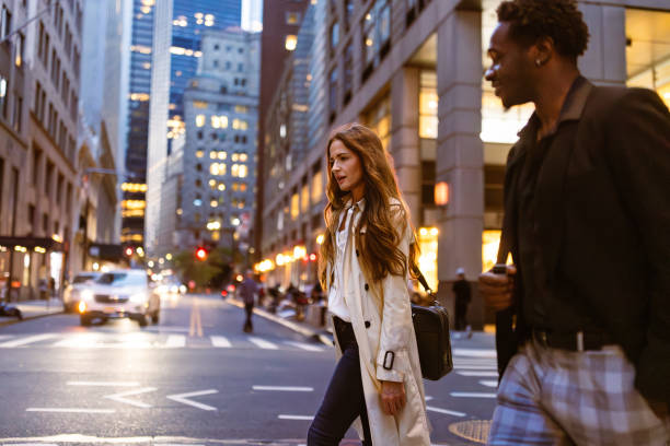 istock Colleagues rushing through Wall Street area 1647090756