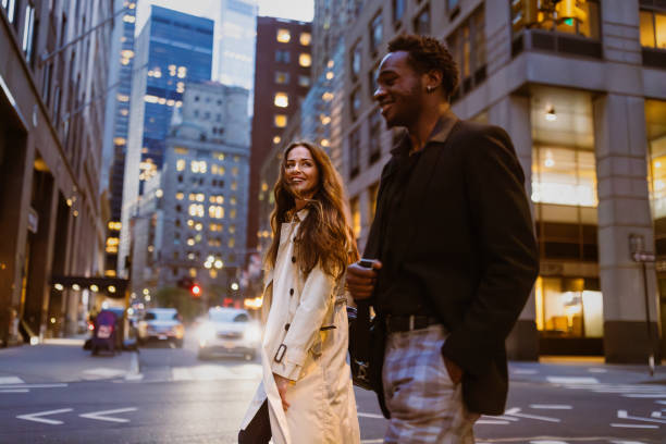 istock Colleagues rushing through Wall Street area 1647090758