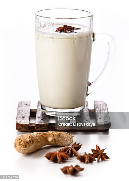 Masala Tea On Wooden Coaster On White Stock Photo - Download Image Now - Anise, Black Tea, Cardamom