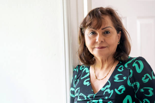 istock Senior Hispanic woman headshot 1647156799