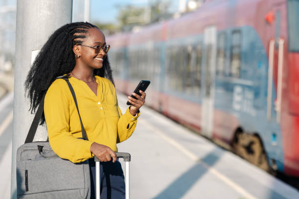 istock Everyday commuting. Young woman waiting for a train. 1647175996