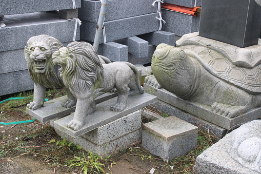 Stone lions in traditional Korean memorial and monument stone supplier outlet