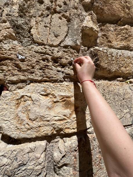 istock Making wish at Western Wall in Jerusalem 1647222669