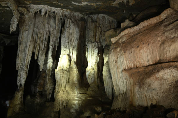 istock Stalagmites and stalactites inside the beautiful Phu Wai cave. 1647264551