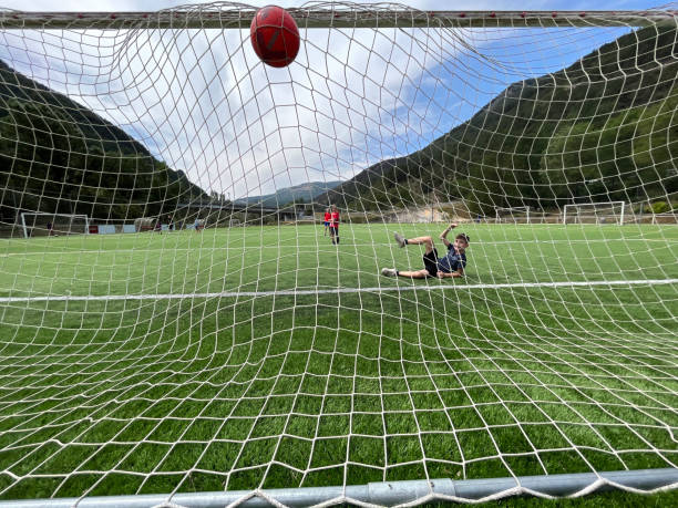 istock friends playing football 1647273870