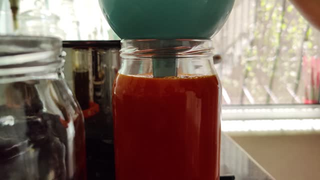 Homemade tomato sauce put in jar