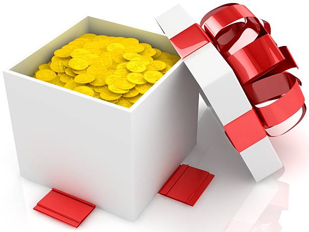 istock Gift box over white background with gold coins 164731802