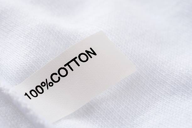 etiqueta de 100% de algodón - 100 percent fotos fotografías e imágenes de stock