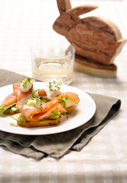 smoked salmon on toast boiled quail eggs topped with cress
