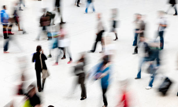 istock people walking in railroad station 164735543