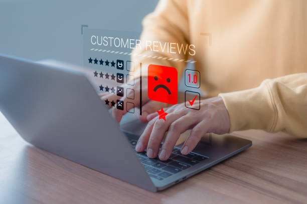istock Unhappy man client with angry emotion face on virtual screen, Bad review, dislike service and quality, low rating, social media not good. Business service concept of customer experience dissatisfied. 1647373111