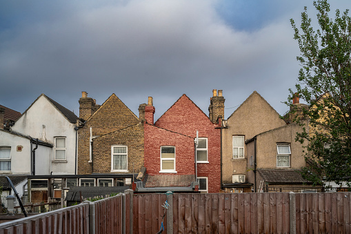 North London terraced housing, rear view on a cloudy day.
