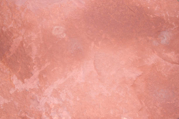 Brown stone with large patterns that are designed to be like nature by heavy machinery, beautifully crafted in a vast lakeside garden, perfect for relaxing and watching nature in summer and winter.