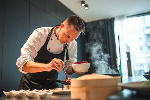 istock Caucasian Chef Cooking Memorable Dishes for Bachelorette Dinner 1647412743
