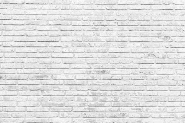 istock White brick wall texture background. wallpaper for interior and exterior and backdrop design. Paint brickwork wall and copy space. 1647424371