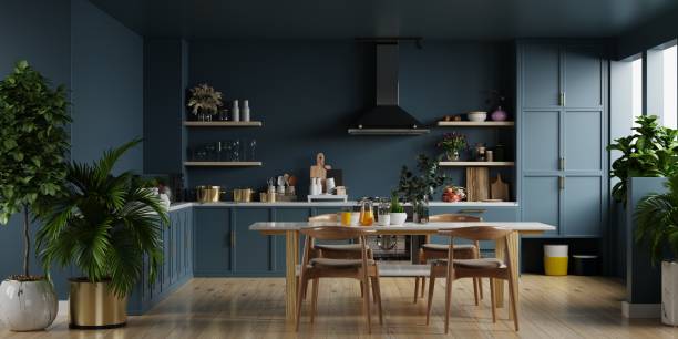 istock Modern kitchen interior with furniture on dark blue wall. 1647514289