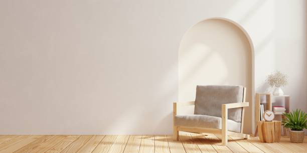 istock Scandinavian living room with grey armchair on empty white wall background. 1647517146