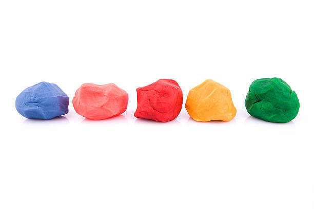 colorful plasticine:Child's Play Clay isolated on white background stock photo