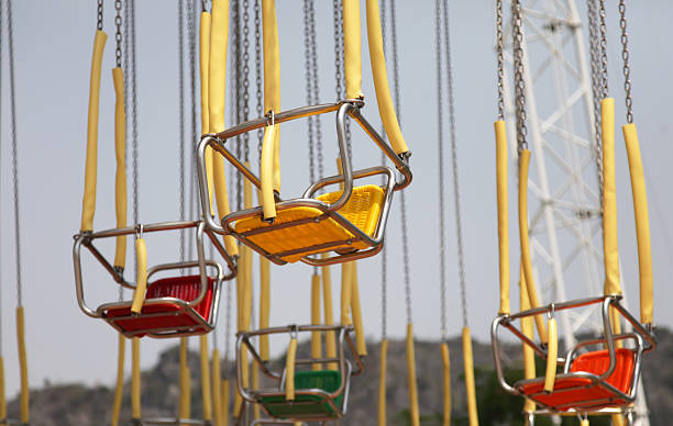 tiovivo de la licencia - amusement park ride seesaw seat carnival fotografías e imágenes de stock