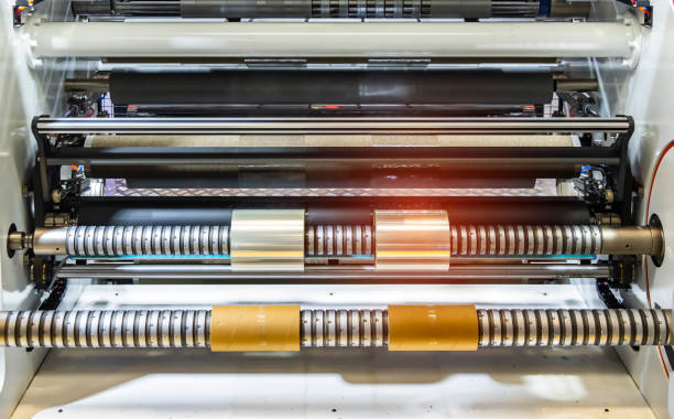 istock Laminating and rewinding kind of protective film machine with clamping rollers automatic edge banding 1647561552