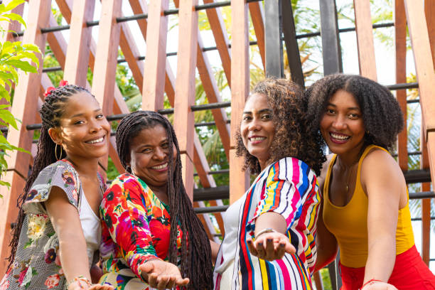 istock Cheerful diverse friends showing welcome gesture with hands 1647633315