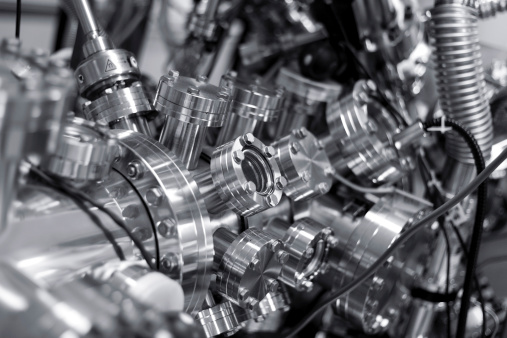 View of part of an ultra-high vacuum chamber of a high performance X-ray photoelectron spectrometer for photoelectron spectroscopy (XPS) and parallel imaging (imaging XPS). Blue toned