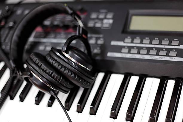 istock Headphones on electronic piano 164764352