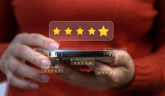 Human use smartphone showing give feedback icon satisfaction survey, five star, customer, satisfaction, review, feedback, top service excellent, Quality assurance 5 star, positive, customer service