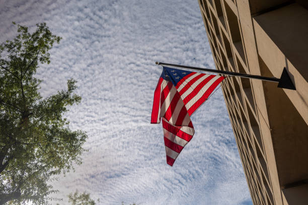 istock Low angle view of american flag 1647702611