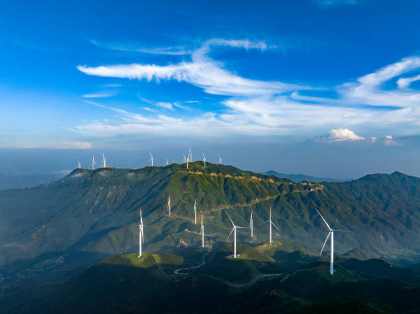 istock Wind power on the mountain, blue sky and white clouds 1647713157