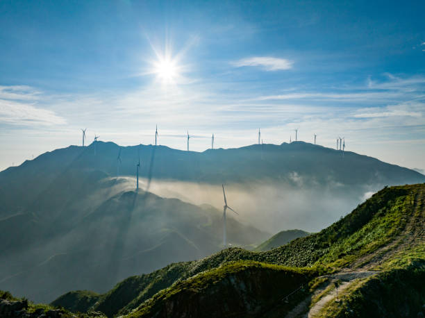 istock Wind power on the mountain, blue sky and white clouds 1647715115