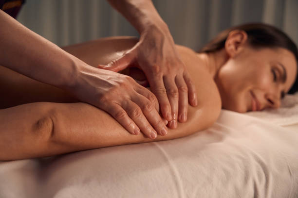 istock Young woman getting upper arm massage at spa 1647731357
