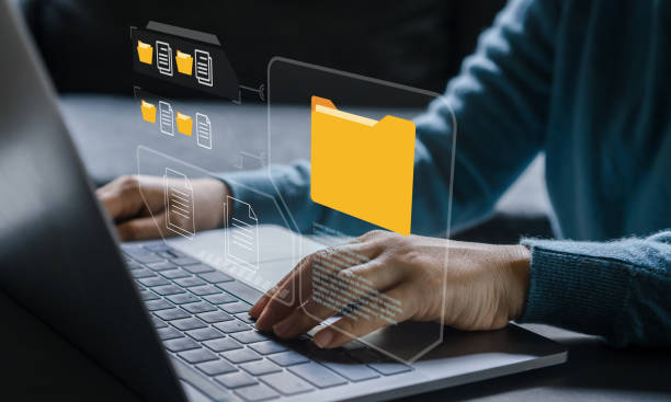 istock Human use laptop with online cloud document file management, information, system, DMS, online documentation database, manage files, enterprise with ERP.search and manage document business technology 1647734386