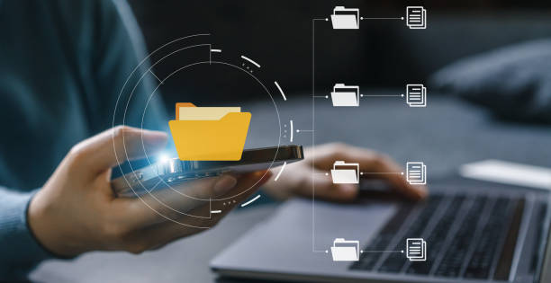 istock Human use phone with online cloud document file management, information, system, DMS, online documentation database, manage files, enterprise with ERP.search and manage document business technology 1647734389