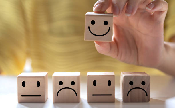 istock Human hold wood emotion smile, give feedback icon satisfaction survey, five star, customer, satisfaction, review, feedback, service excellent, Quality assurance 5 star, positive, customer service 1647737965